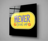 “Never Give Up” Glass Wall Art